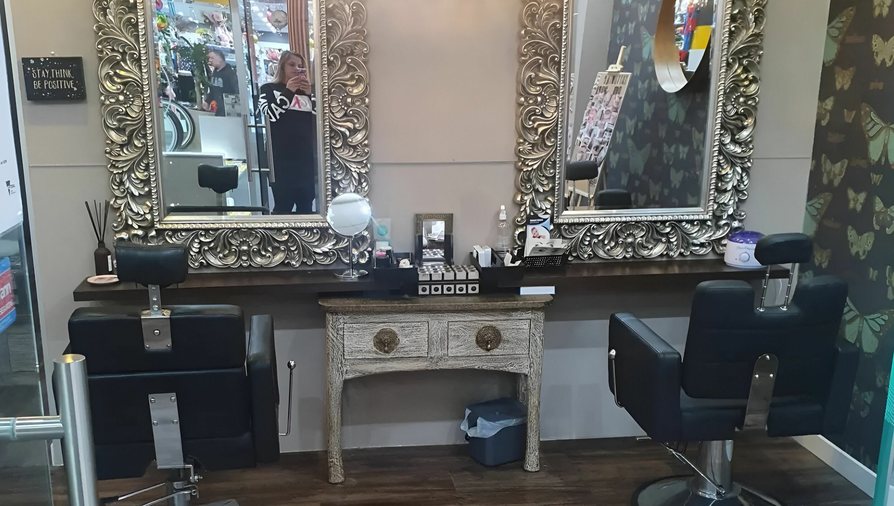 Stylish hair salon setup at INKredible Beauty N Laser, Melbourne, Victoria, AU featuring ornate mirrors.