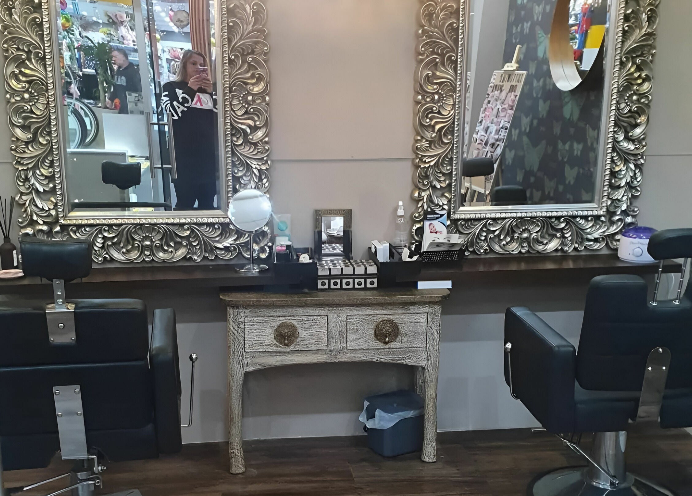 Stylish hair salon setup at INKredible Beauty N Laser, Melbourne, Victoria, AU featuring ornate mirrors.