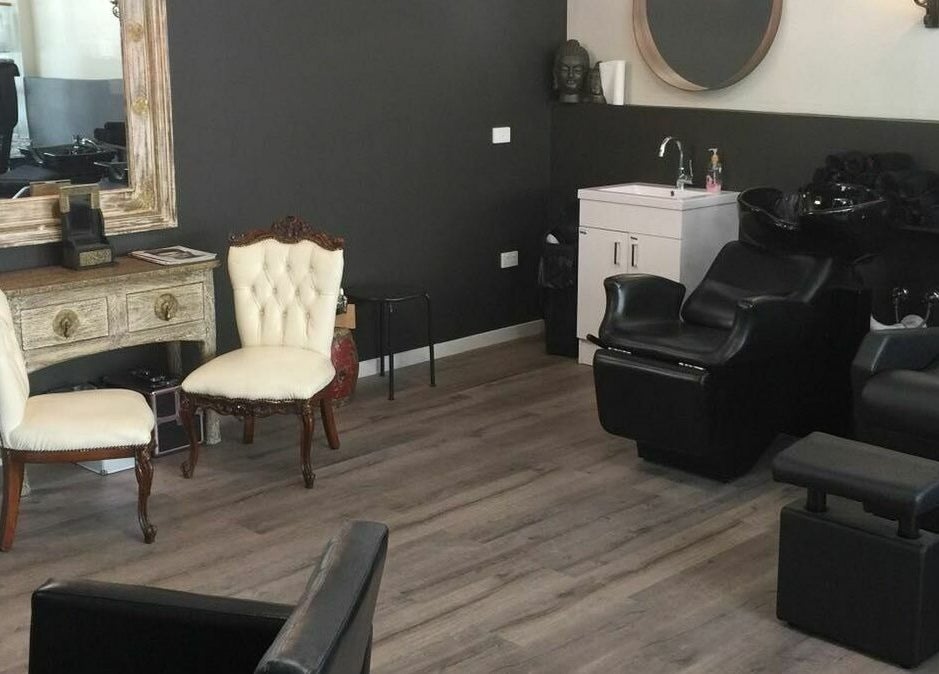 Relaxing salon seating at INKredible Beauty N Laser, Melbourne, Victoria, AU, blending vintage elegance with modern comfort.