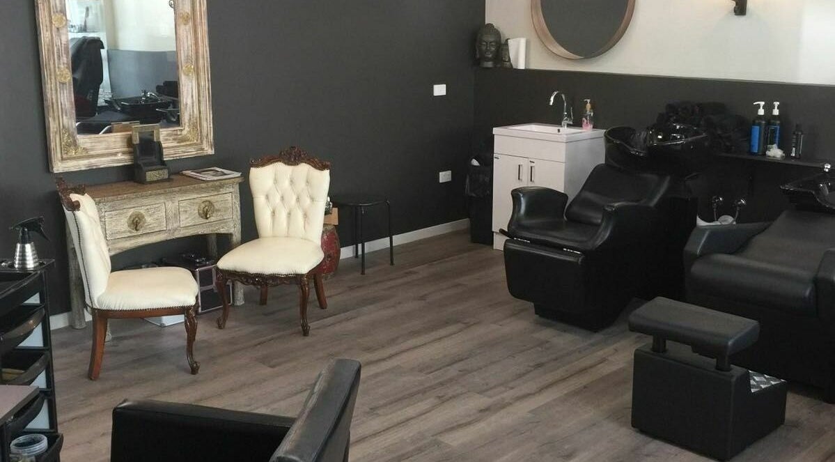 Relaxing salon seating at INKredible Beauty N Laser, Melbourne, Victoria, AU, blending vintage elegance with modern comfort.