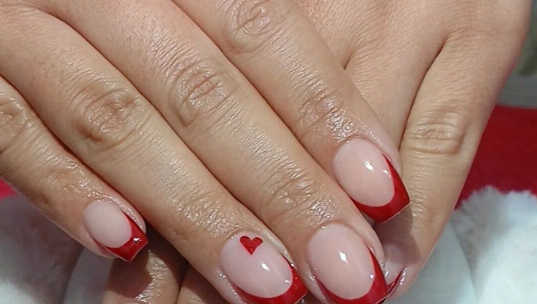 Stylish red heart manicure at GkaBeauty's nails lashes &brows, Johannesburg, Gauteng, ZA.