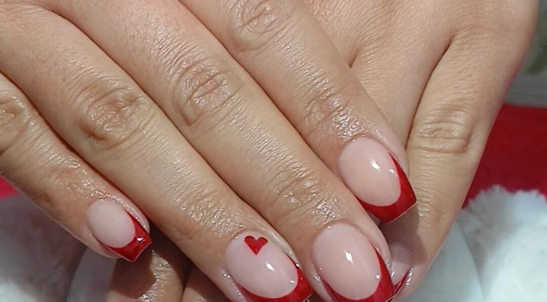 Stylish red heart manicure at GkaBeauty's nails lashes &brows, Johannesburg, Gauteng, ZA.