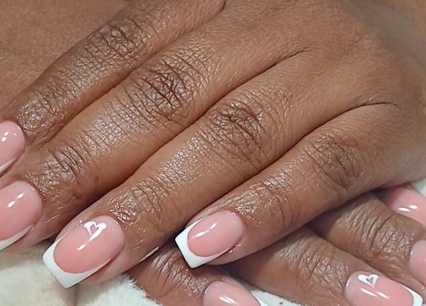 French manicure with heart at GkaBeauty's nails lashes &brows, Johannesburg, Gauteng, ZA.