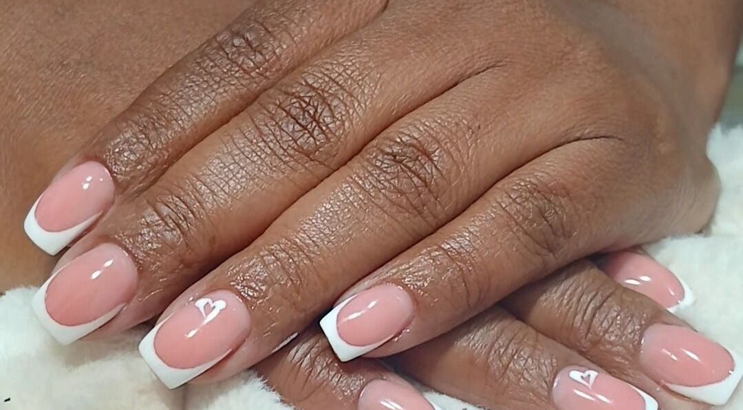 French manicure with heart at GkaBeauty's nails lashes &brows, Johannesburg, Gauteng, ZA.