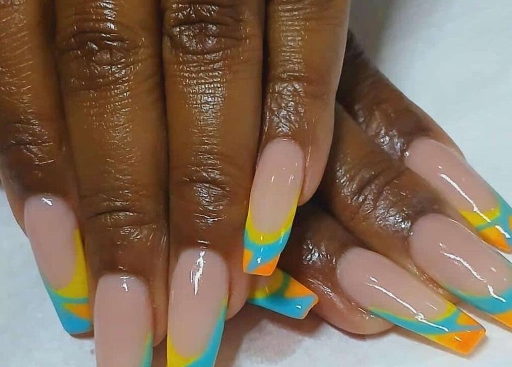 Colorful nail art at GkaBeauty's nails lashes & brows, Johannesburg, Gauteng, ZA showcasing vibrant designs.