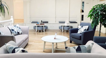 Comfortable seating area at Yakseva (Light Centre Belgravia), London, England, GB with modern decor.