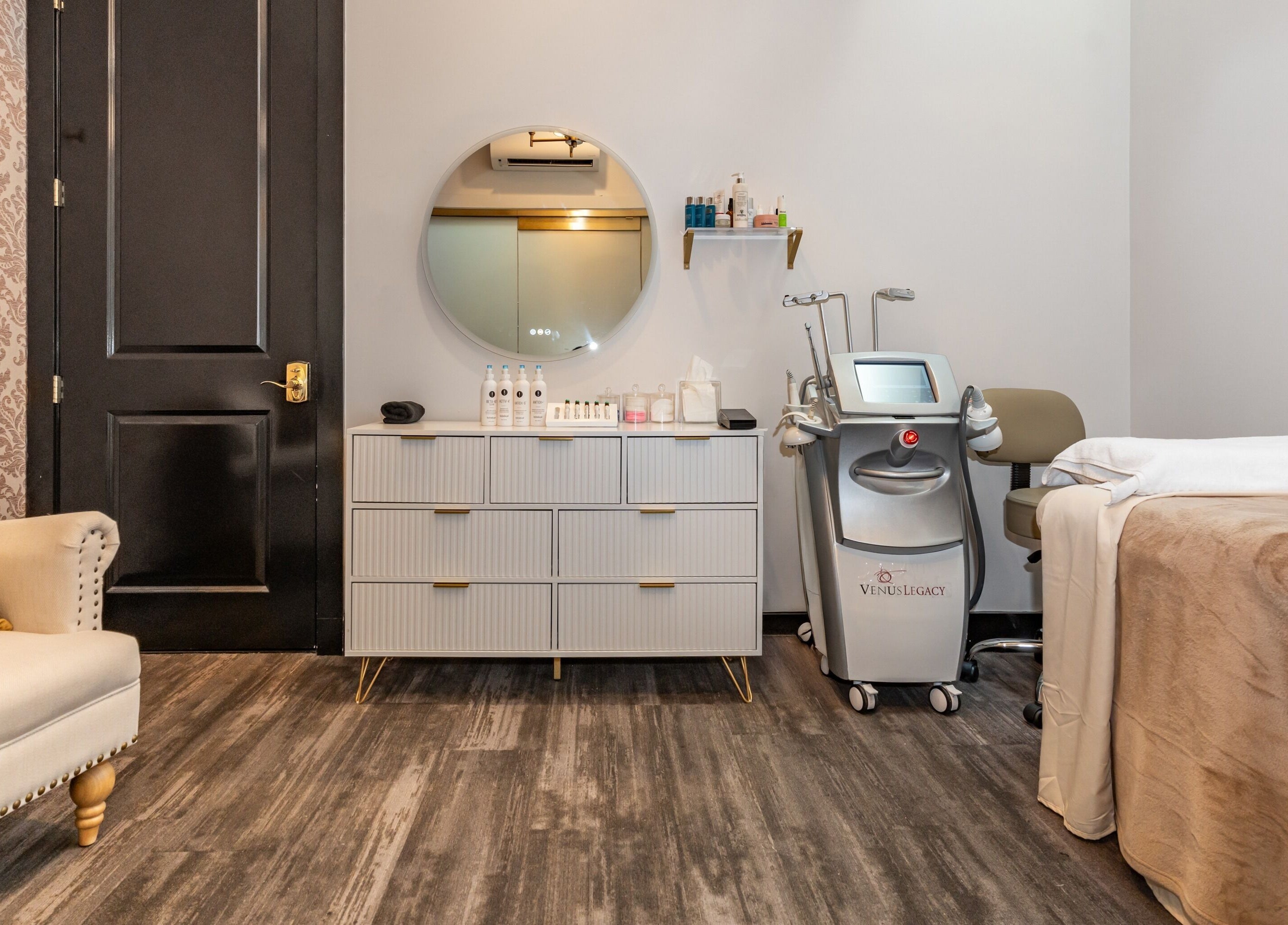 Elegant treatment room at NU Laser Spa in Great Neck Plaza, New York, offering a tranquil wellness experience.