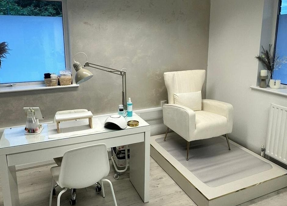 Modern, elegant beauty room at JM Aesthetically Yours, Hilton, England, GB, featuring spa chair and white desk.