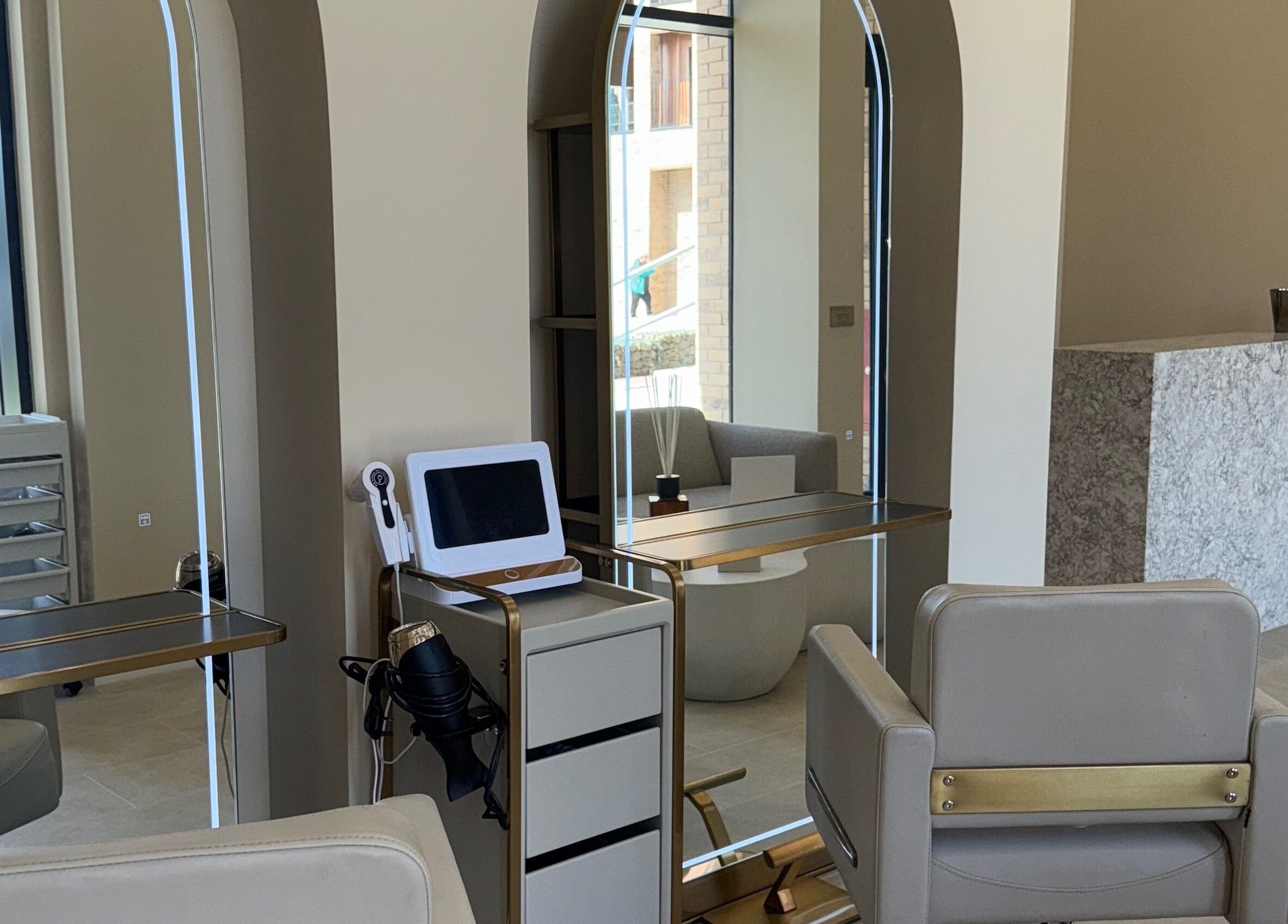 Sleek styling station at Head Bath Glasgow, featuring modern mirrors and seating. Glasgow, Scotland, GB.