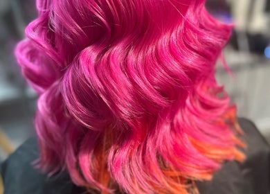 Bold pink hair waves styled at Divine Hair and Aesthetics, Middlesbrough, England, GB.