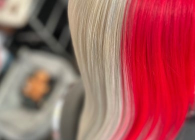 Bold blonde and red hair coloring at Divine Hair and Aesthetics, Middlesbrough, England, GB.
