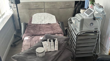 Tranquil spa room at Divine Hair and Aesthetics, Middlesbrough, England, GB, featuring comfortable treatment bed.