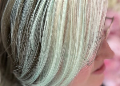 Close-up of sleek, blonde hair at Divine Hair and Aesthetics, Middlesbrough, England, GB.
