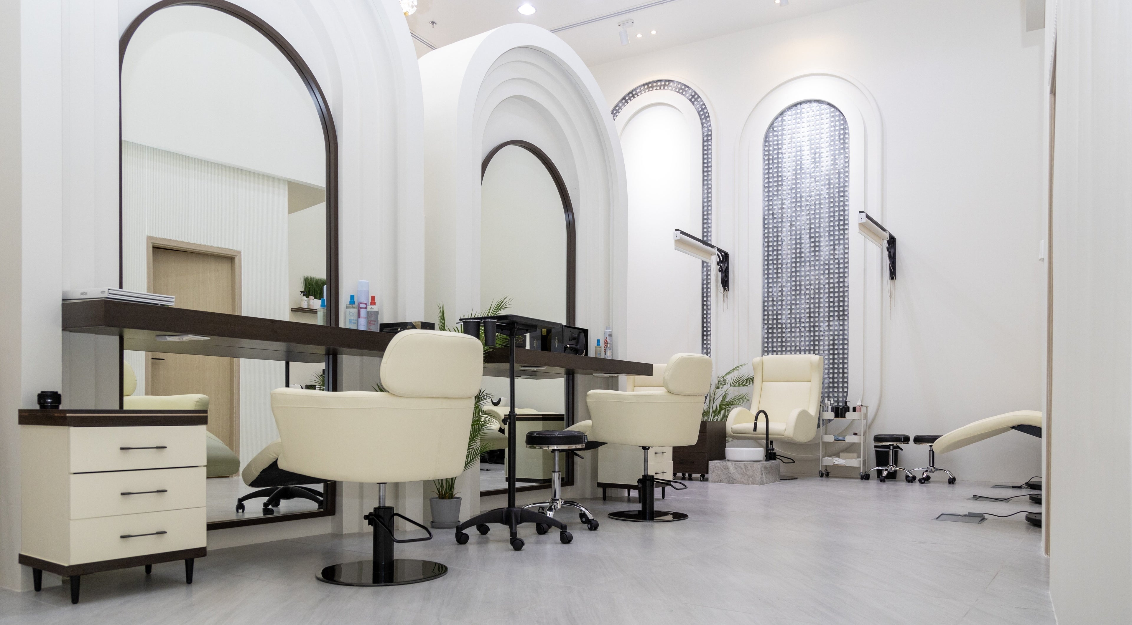 Elegant interior of Eleven Signature Beauty Salon LLC, Dubai, AE with plush chairs and stylish decor.