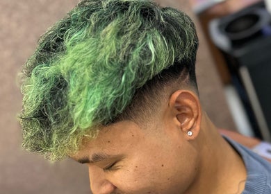 Green hairstyle with a fade at Syahrul Ilham, Riau Islands, Riau Islands, ID.