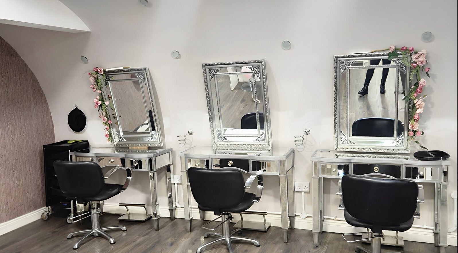 Elegant styling stations at Mya Mays Hair Salon, Dublin, County Dublin, IE, featuring ornate mirrors and chairs.