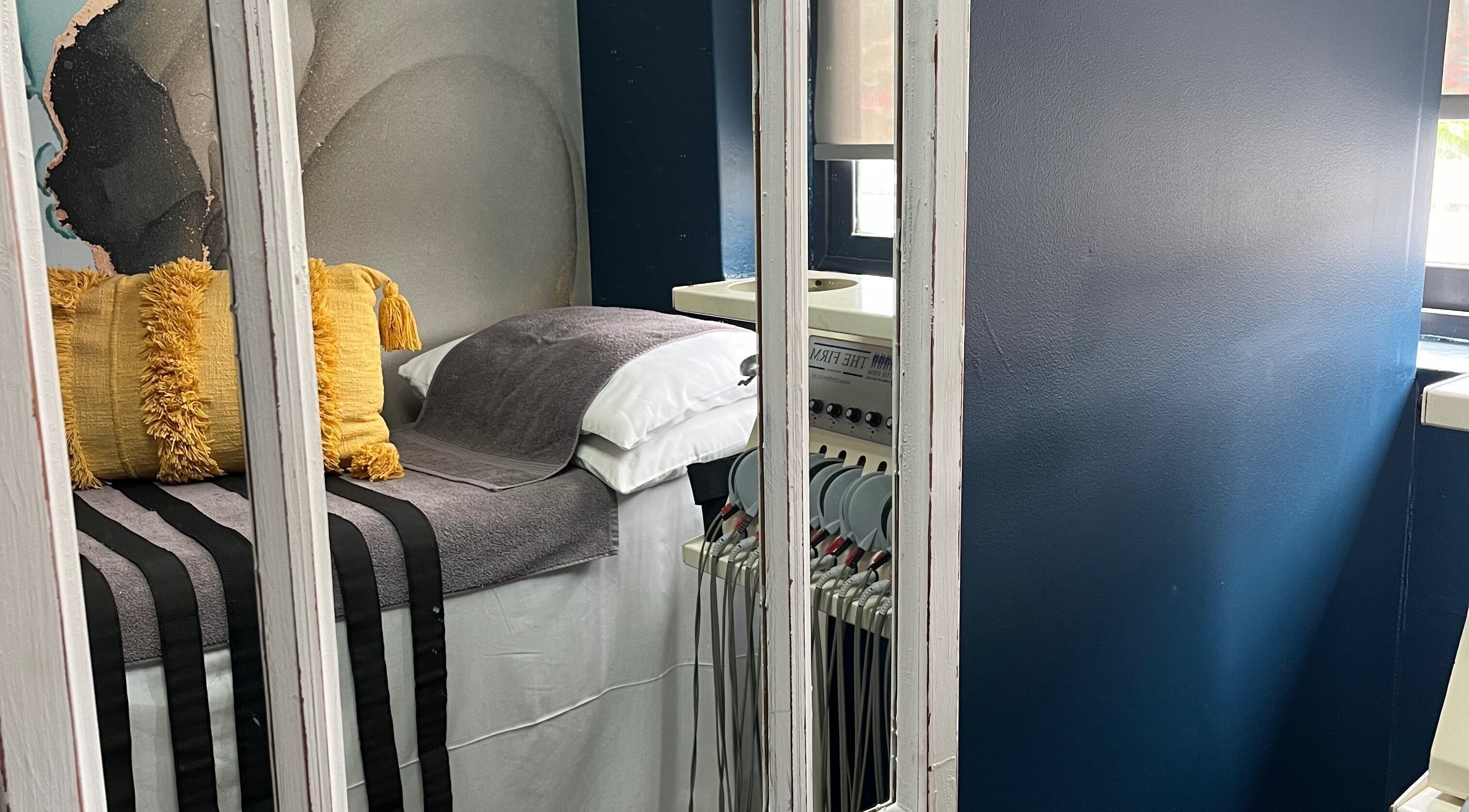 Comfortable bed with yellow pillow at The Firm Durban North, Durban North, Kwazulu-natal, ZA.