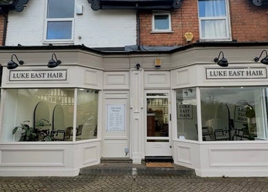 Front view of Luke East Hair salon in Birmingham, England, GB with stylish facade and signage.