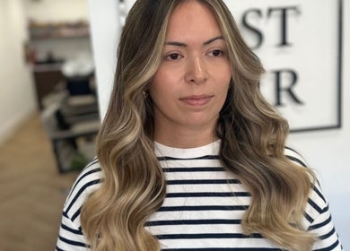 Woman with cascading waves at Luke East Hair, Birmingham, England, GB.
