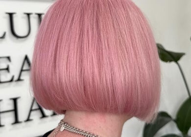 Close-up of a stylish pink bob haircut at Luke East Hair in Birmingham, England, GB.