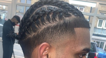 Stylish braided hair at NJ Clipzz, Keighley, England, GB, showcasing expert grooming.