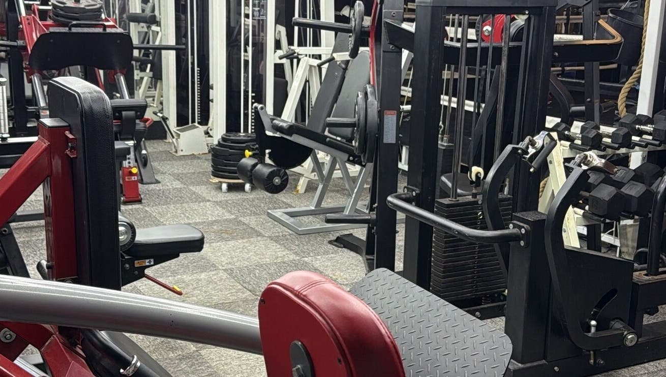 Gym equipment at Tay Walker Boxing, Blackpool, England, GB, showcasing diverse fitness machines.