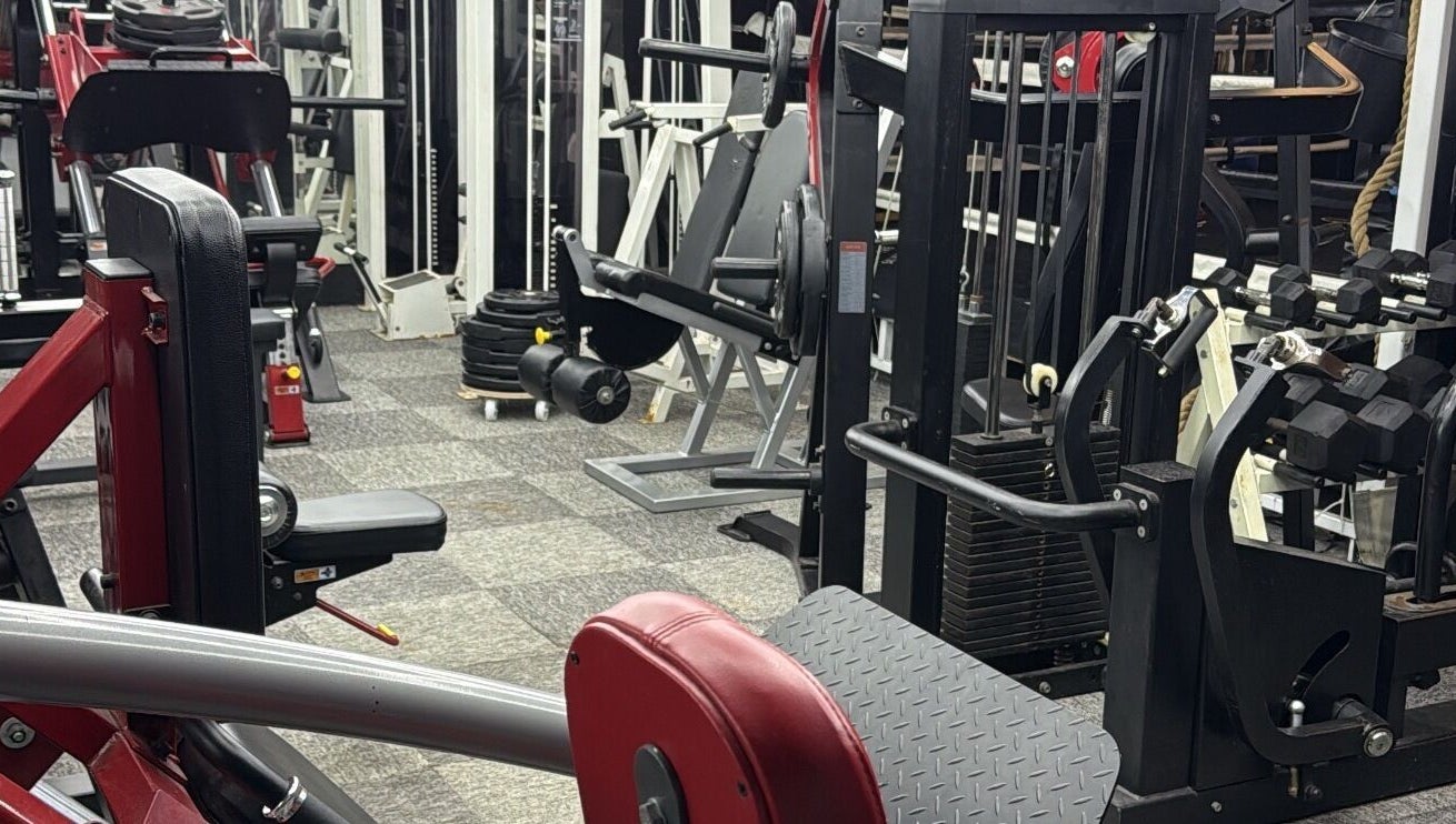 Gym equipment at Tay Walker Boxing, Blackpool, England, GB, showcasing diverse fitness machines.