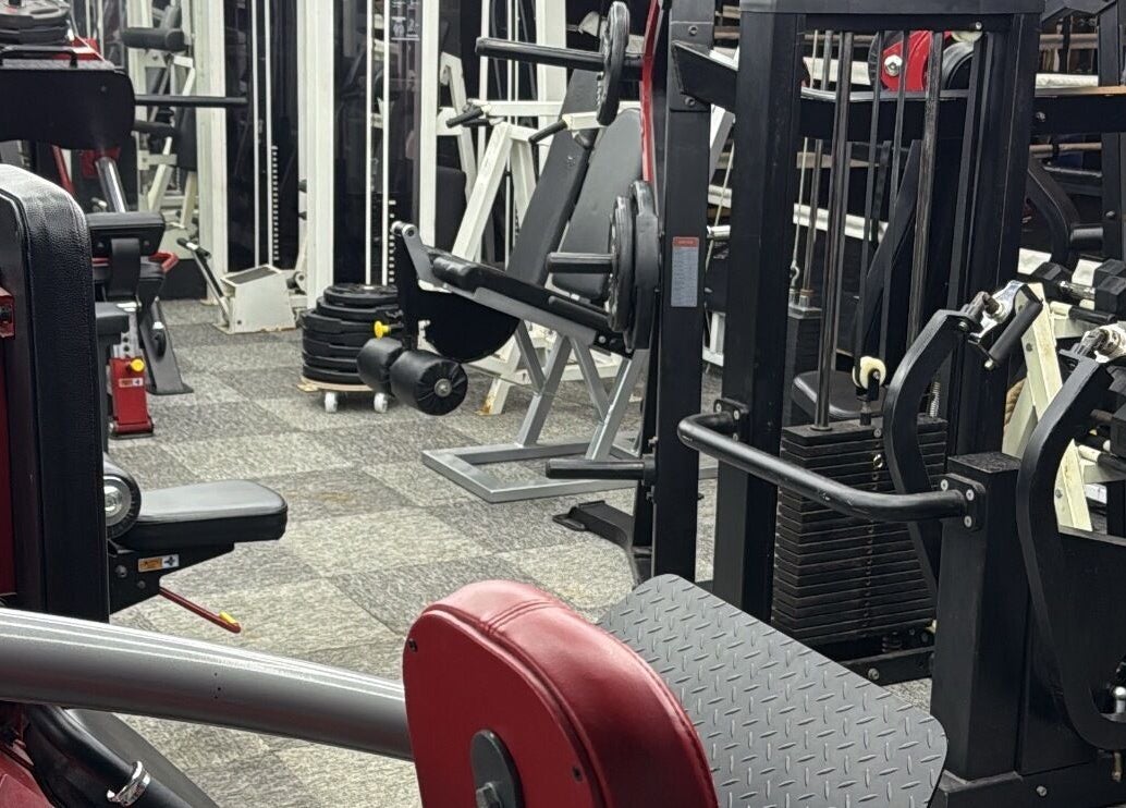 Gym equipment at Tay Walker Boxing, Blackpool, England, GB, showcasing diverse fitness machines.