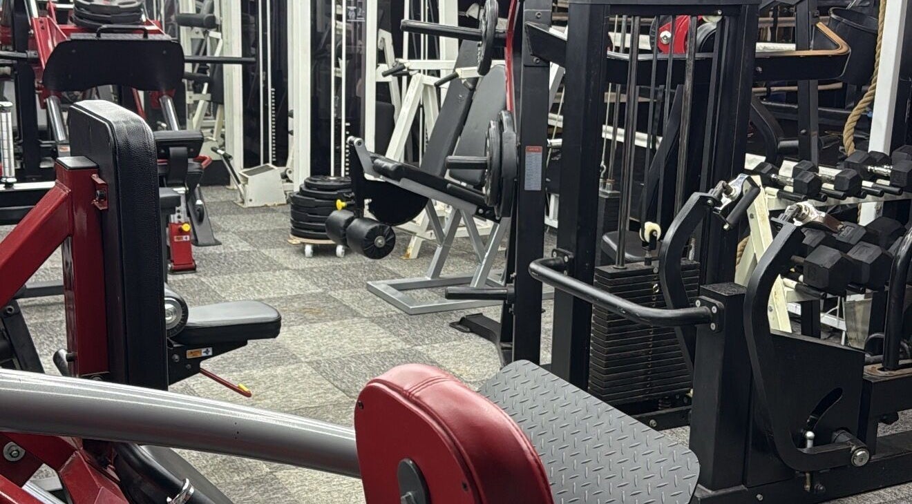 Gym equipment at Tay Walker Boxing, Blackpool, England, GB, showcasing diverse fitness machines.