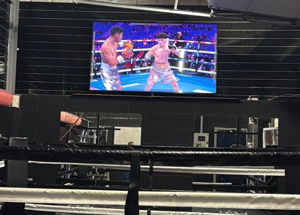 Live boxing match displayed at Tay Walker Boxing, Blackpool, England, GB inside the ring.