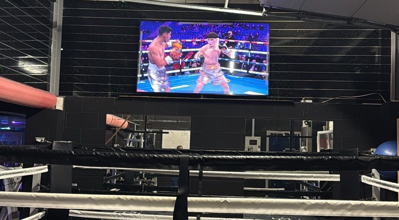 Live boxing match displayed at Tay Walker Boxing, Blackpool, England, GB inside the ring.