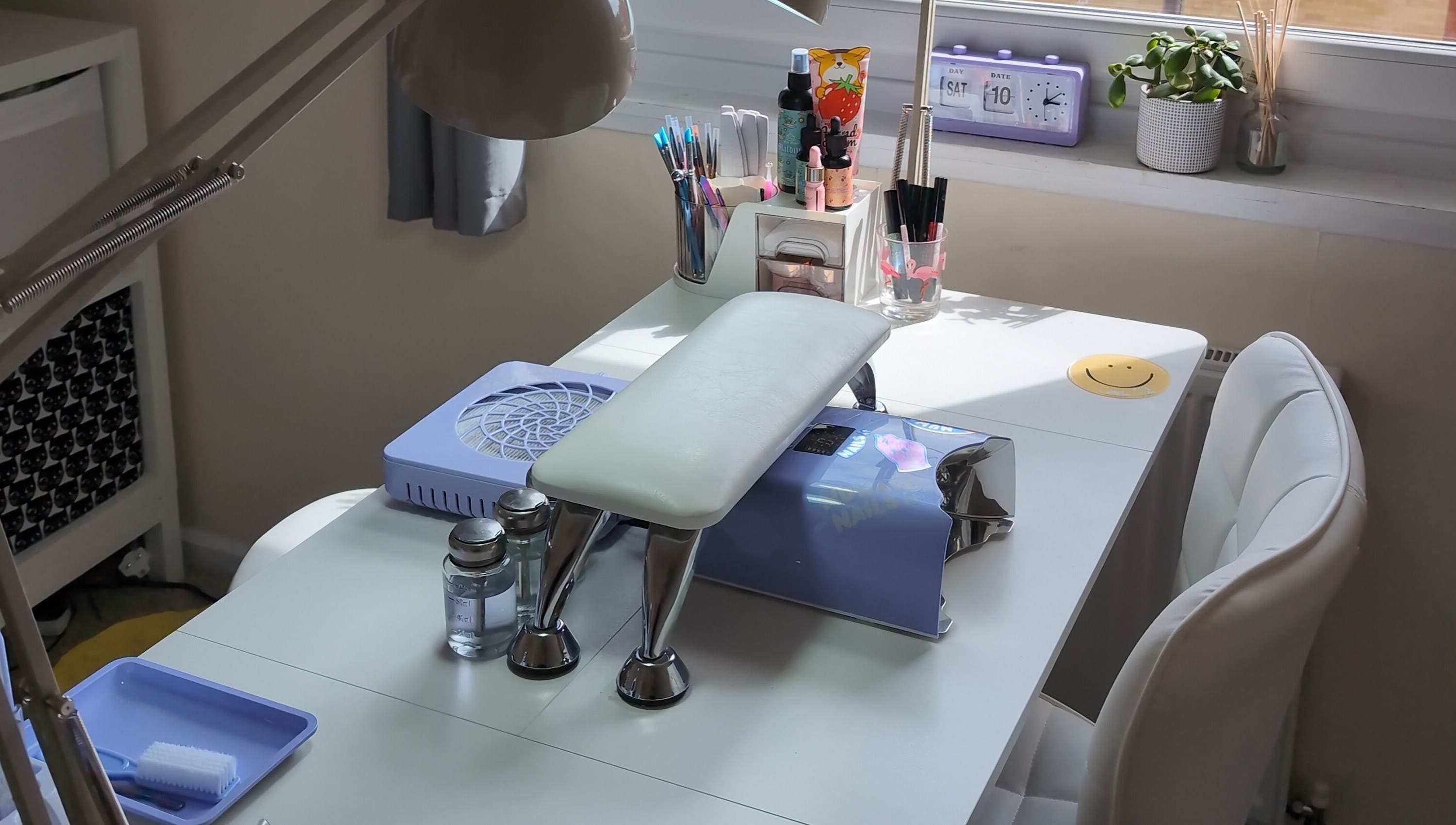 Modern nail station at NUWAVE NAILS - Prestwick (Home Studio) in Prestwick, Scotland, GB, with tools and decor.