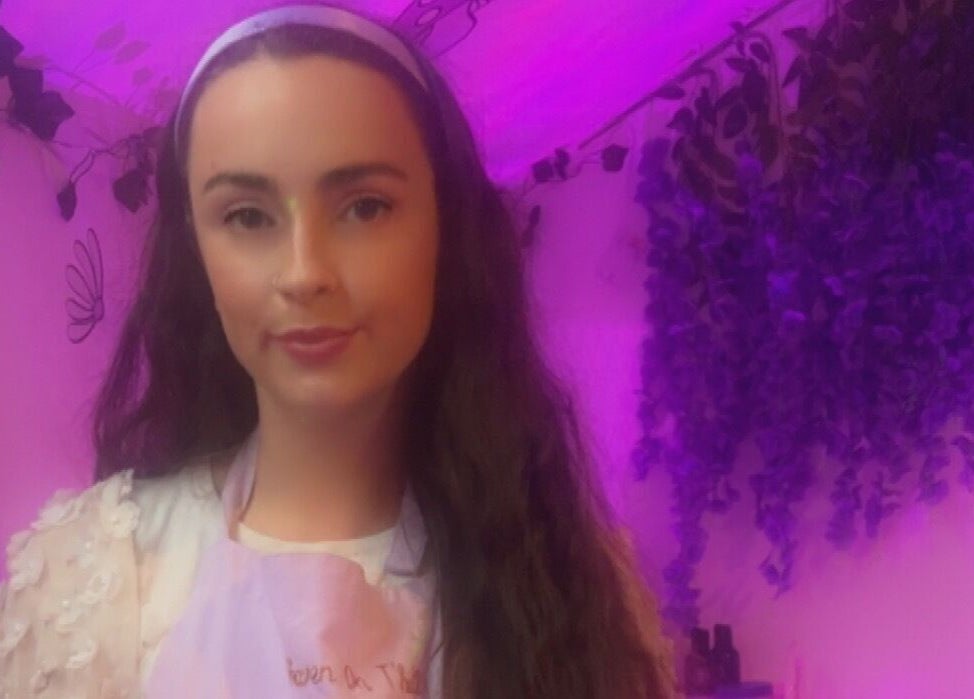 Woman in serene setting at Heaven On T'hill, Todmorden, England, GB. Lavender tones create a calm, inviting atmosphere.