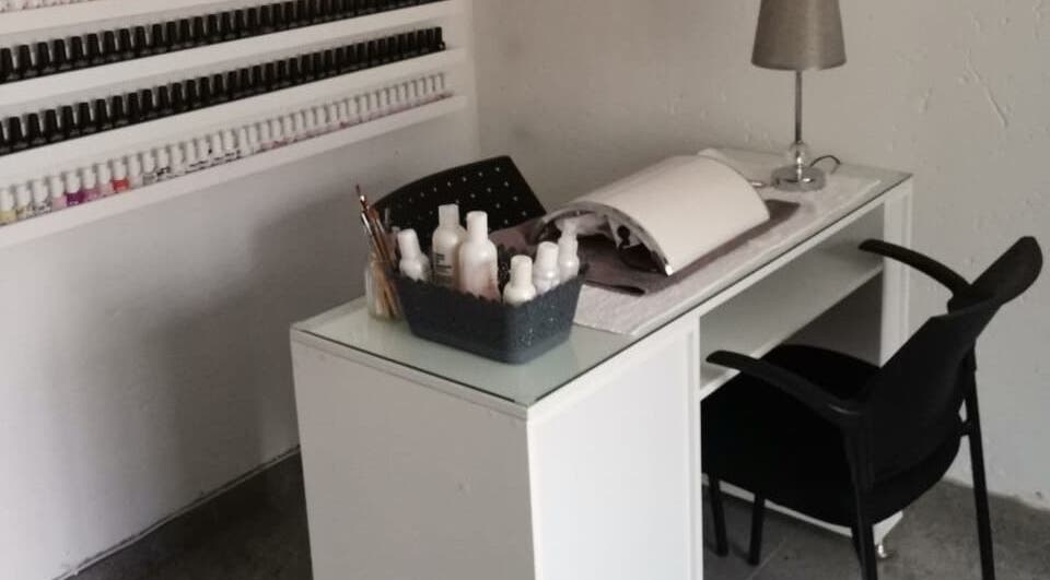 Modern nail station at Nails by Thuba in Benoni, Gauteng, ZA, showcasing stylish design and manicure essentials.