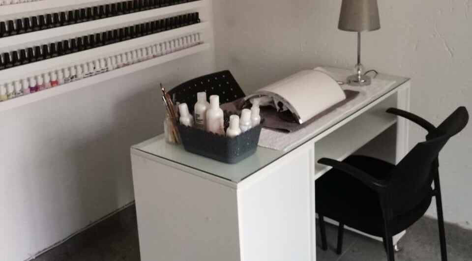 Modern nail station at Nails by Thuba in Benoni, Gauteng, ZA, showcasing stylish design and manicure essentials.