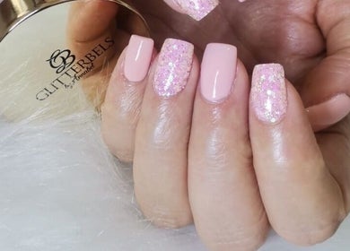 Glittery pink nails by Nails by Thuba in Benoni, Gauteng, ZA, showcasing delicate, glossy design.