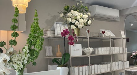 Floral arrangements and beauty products at VitalSkin Aesthetics in Birchgrove, New South Wales, AU.
