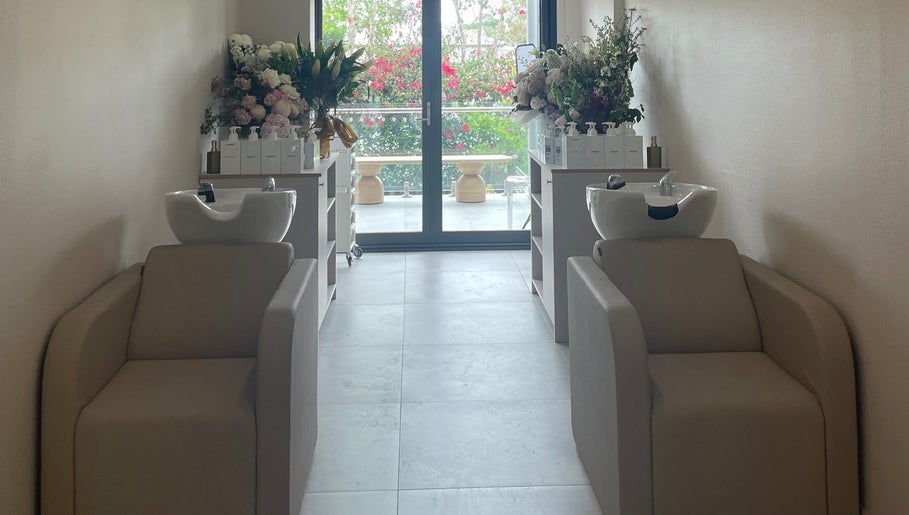 Elegant wash stations at Vital Skin Aesthetics, Birchgrove, New South Wales, AU, featuring fresh floral decor.