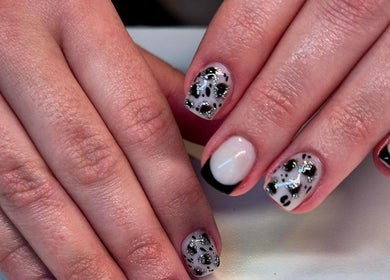 Chic leopard print nail art at Anne's Nails & Toes in Pretoria, Gauteng, ZA.