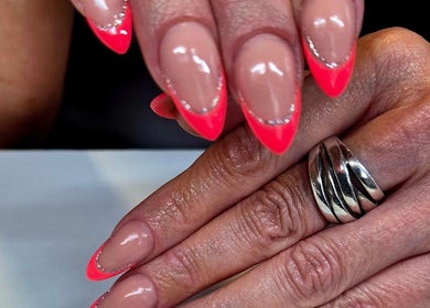 Neon pink nails with silver accents at Anne's Nails & Toes, Pretoria, Gauteng, ZA.