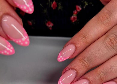Elegant pink polka dot nail art at Anne's Nails & Toes in Pretoria, Gauteng, ZA.