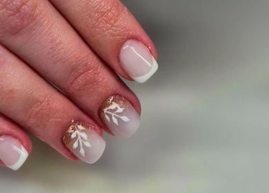 Floral nail art design at Anne's Nails & Toes, Pretoria, Gauteng, ZA showcases detailed elegance.