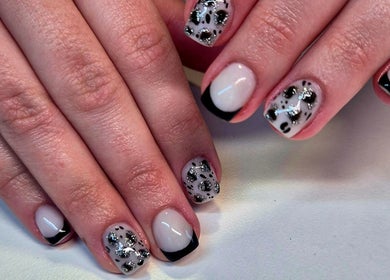 Stylish black and white nails at Anne's Nails & Toes in Pretoria, Gauteng, ZA showcasing elegant nail art.