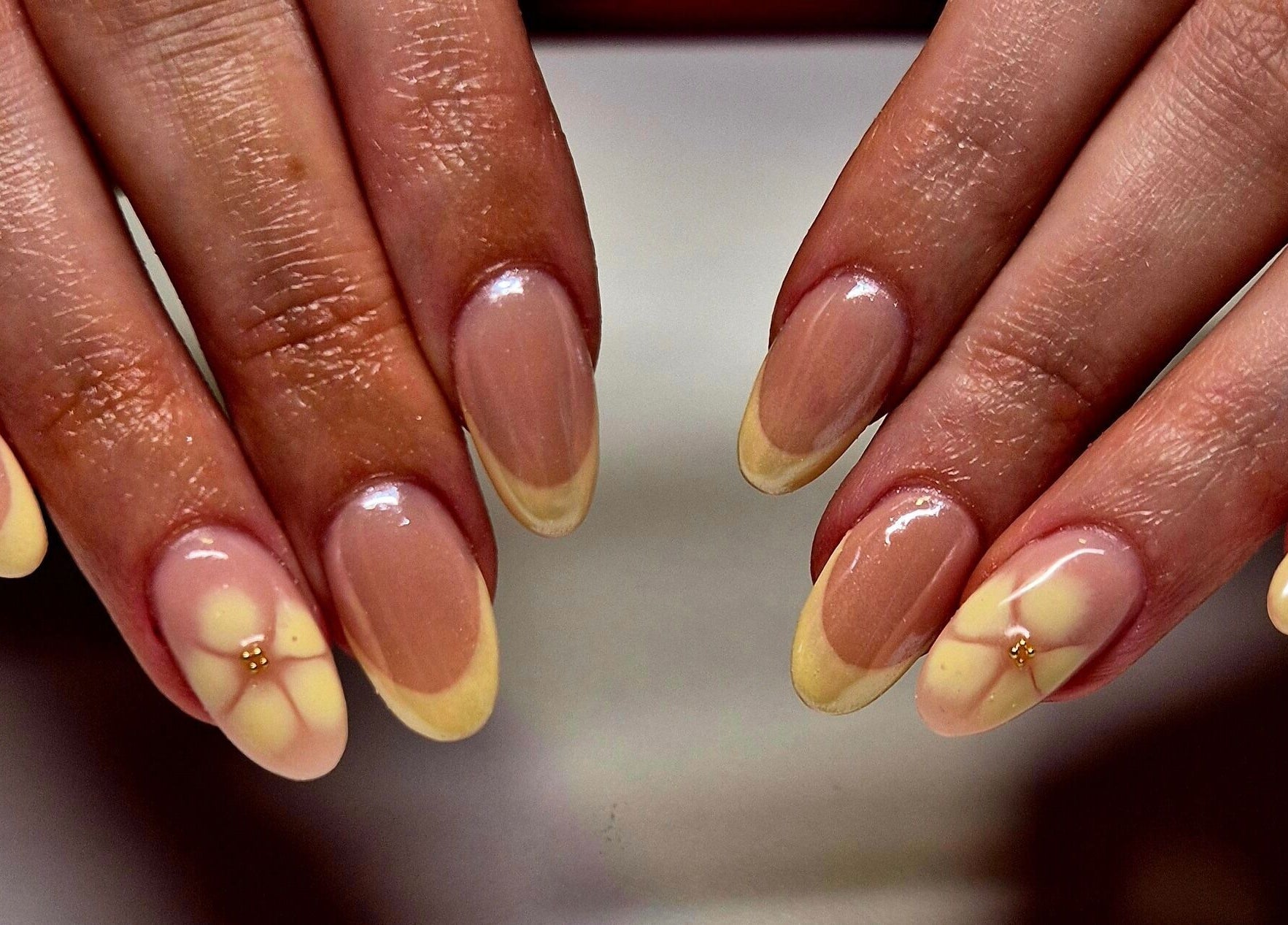 Floral nail art at Anne's Nails & Toes, Pretoria, Gauteng, ZA, showcasing intricate, glossy designs.