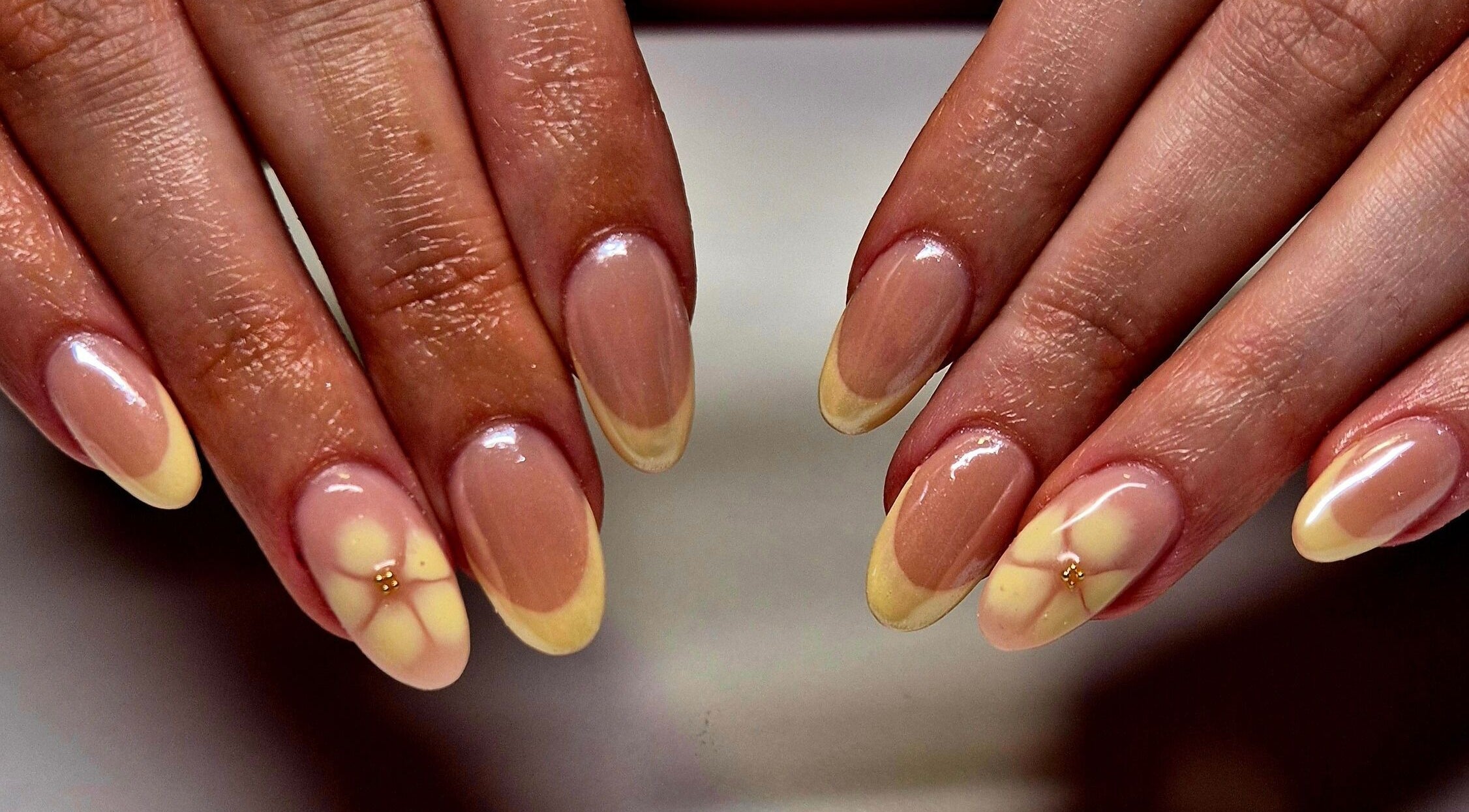 Floral nail art at Anne's Nails & Toes, Pretoria, Gauteng, ZA, showcasing intricate, glossy designs.