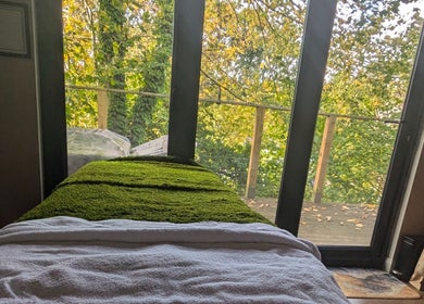Relaxing spa bed with lush green view at Sakura Wellness Institute, Audley, England, GB.