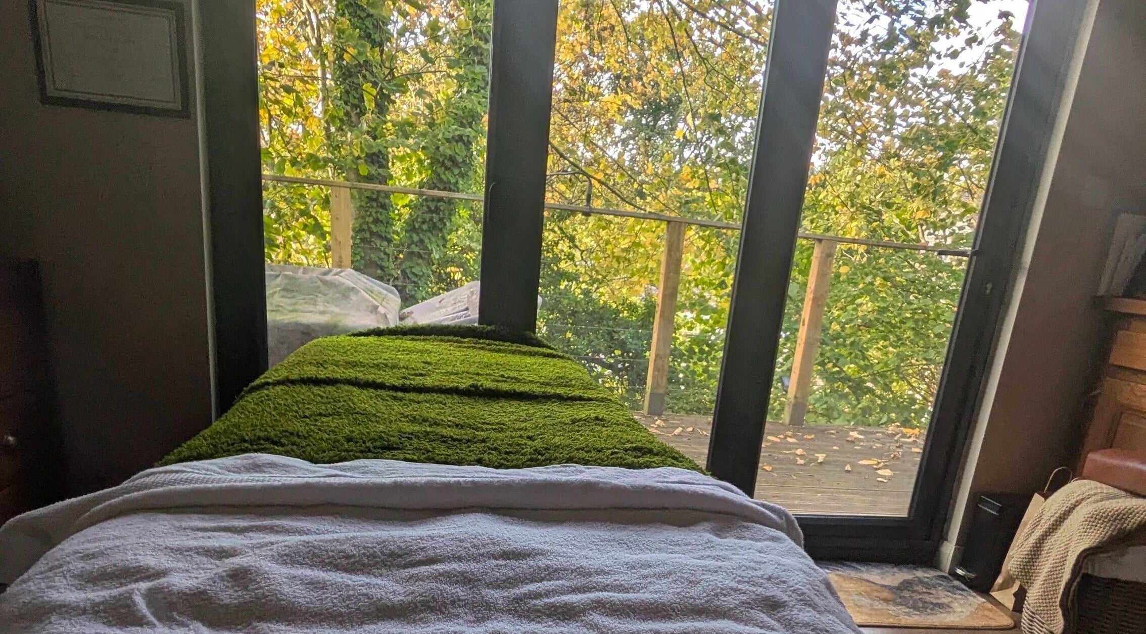 Relaxing spa bed with lush green view at Sakura Wellness Institute, Audley, England, GB.