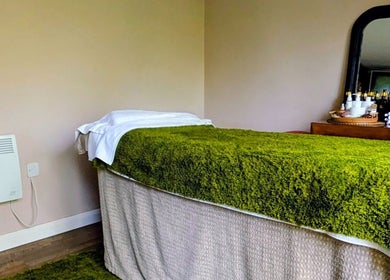 Calming treatment room at Sakura Wellness Institute in Audley, England, GB ready for a rejuvenating experience.