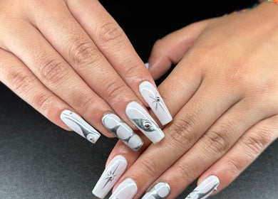 Elegant silver and white nail art at Glow Studio Coral Springs, Coral Springs, Florida, US.
