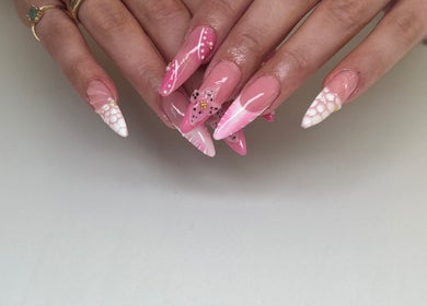 Elegant pink nail art design at ÀTÍKÉ LONDON, London, England, GB capturing beauty expertise.